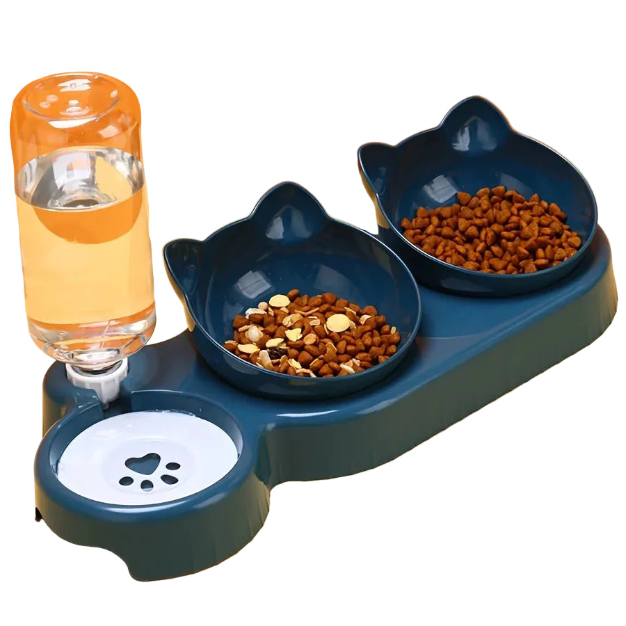 Pet feeding station with two bowls of food and a glass of water on an orange background